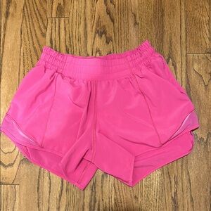 Lululemon Pink Hotty Hot shirts size 4, with 4 inch inseam

Like new condition